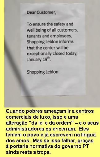 Aviso � porta de um Centro Comercial do Rio de Janeiro.